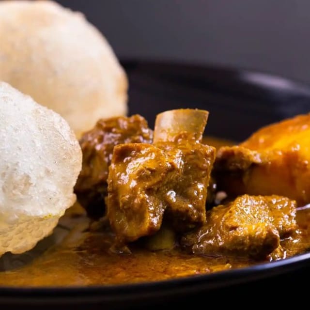 Poori with Goat Curry.
